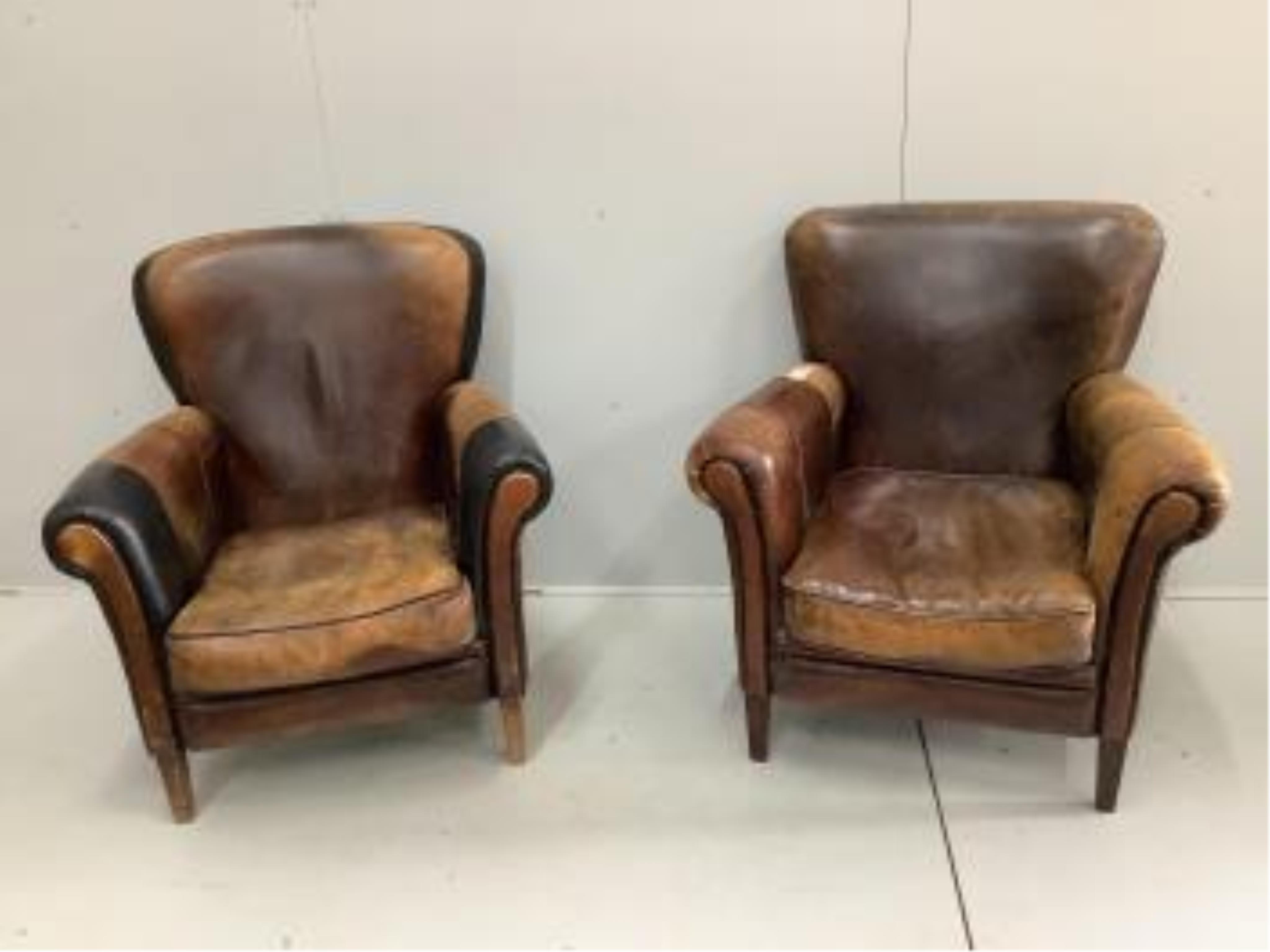 A leather settee, width 156cm, depth 78cm, height 82cm, and a pair of leather wing armchairs. Condition - fair